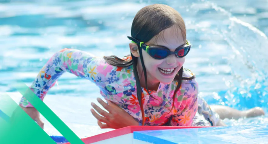 Child swimming in pool
